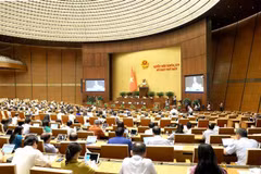 Legislators will continue delving into important issues relating some draft laws on June 21. (Photo: VNA)