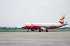 Cat Bi Intẻnational Airports welcomes the first flight from Lijiang, China's Yunnan province on June 15. (Photo: VNA)