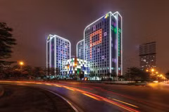 FPT's headquarters in Cau Giay District, Hanoi. FPT is collaborating with Nvidia to build a 200 million USD AI factory and provide a cloud computing platform for AI research and development, including the potential production of GPU graphics chips. (Photo courtesy of FPT)