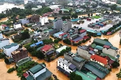 Torrential downpour in several areas in Ha Giang province in June. (Photo: VNA)