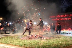 Red Dao ethnic people perform fire dancing in Tuyen Quang province