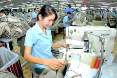 Sustainable growth of industrial exports discussed in Hanoi