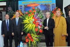 Catholic solidarity committee hosts pre-Christmas gathering