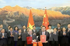Vietnamese NA, China’s NPC sign cooperation agreement