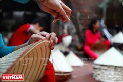 Ngoc My conical hats in the making