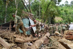 Race against time to find landslide victims in Quang Nam