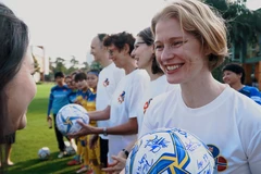 Ambassadors send Tet greetings, gender equality messages with female footballers