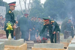 Reburial service held for soldier remains repatriated from Laos