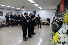 Ceremonies held overseas for former Party leader