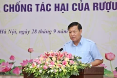 Official urges stronger actions against alcohol harms