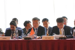 Deputy Minister of Public Security Major General Nguyen Ngoc Lam (centre) at the conference (Photo: VNA)