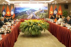 The talks between NA Vice Chairman Nguyen Duc Hai and his Lao counterpart Sommad Pholsena in Da Nang city on September 4, (Photo: VNA)