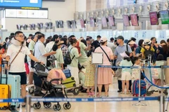 Passengers at Noi Bai International Airport (Photo: VNA)