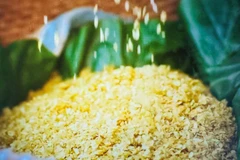 Green rice flakes (Photo: VietnamPlus)