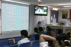 Shares up again on late buying