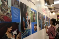 Photo exhibition portrays beauty of breastfeeding