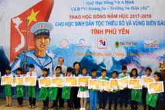 Scholarships presented to students in flood hit regions