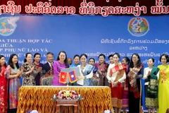 Women’s Unions of Vietnam, Laos seek to foster cooperation 