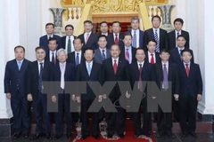 Lao delegation to fifth theoretical workshop greeted in Kien Giang 