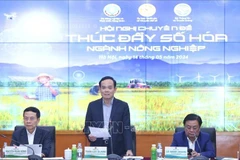 Deputy Prime Minister Tran Luu Quang speaks at a May 14 specialised conference on promoting digitalisation in agriculture. (Photo: VNA)