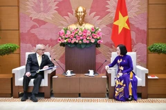 Vice Chairwoman of the National Assembly (NA) Nguyen Thi Thanh (R) and Chairman of the Thailand-Vietnam Parliamentarians’ Friendship Group Sakchai Tanaboonchai at their meeting in Hanoi on June 27 (Photo: VNA)