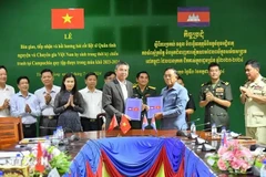 At the sigining ceremony on July 3 (Photo: VNA)