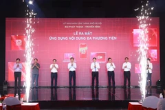 At the launch ceremony of the application Hanoi On on July 10. (Photo: VNA)