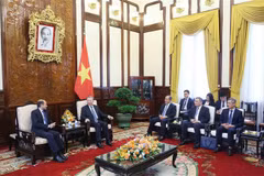 President To Lam and Indian Ambassador to Vietnam Sandeep Arya at their meeting in Hanoi on June 26. (Photo: VNA)