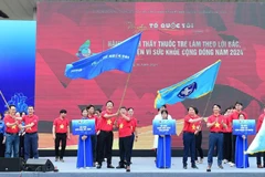 At the launch ceremony of the volunteer campaign in Hanoi on March 18. (Photo: VNA)