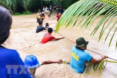 Philippines declares disaster status of four areas affected by storm Nalgae