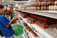 Singapore tightens monetary policy to fight inflation