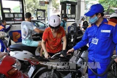 Petrol prices up over 900 VND per litre