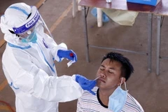 Laos confirms first Omicron variant infection 