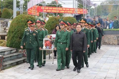 Reburial ceremony held for remains of Vietnamese martyrs repatriated from Laos