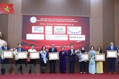 Seven NGOs awarded PM’s certificates of merit for contributions to Vietnam’s development