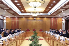 Politburo urges quicker investigations, settlement of serious corruption cases