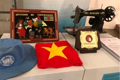 Peacekeeping officers present souvenirs to Vietnam Women's Museum