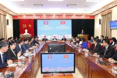 Vietnam, Laos share experience in mass mobilisation