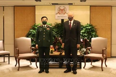 Vietnam, Singapore agree to implement defence cooperation fruitfully