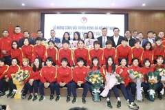 Women’s football team showered with bonuses