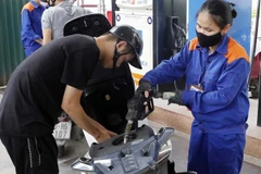 Petrol prices down slightly
