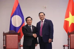 Prime Minister Pham Minh Chinh meets Lao counterpart in US