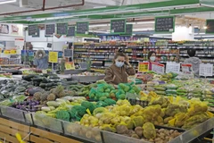 Higher demand drives consumer prices up ahead of Tet