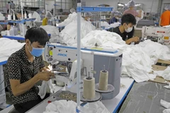 Firms urged to make greater efforts to fulfil year-end export target