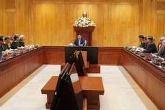 Lao leaders appreciate great sacrifice by Vietnam's volunteer experts, soldiers