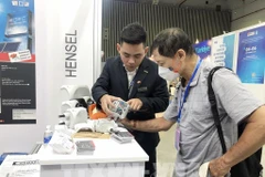 Power, maritime expos underway in HCM City