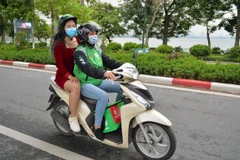 Motorbike taxi services returns in Hanoi