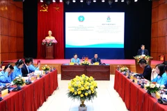 Vietnam, Laos promote trade union cooperation