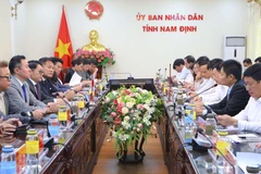 A delegation of Japanese parliamentarians and businesses holds working session with leaders of Nam Dinh province on July 4 (Photo: VNA)