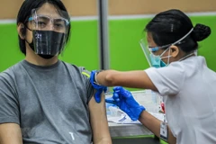 Philippines applies measures to encourage people to get COVID-19 vaccine shots
